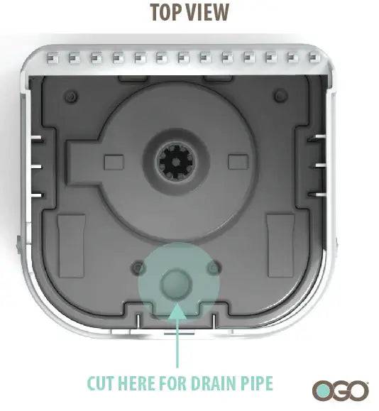 Top view of OGO Origin Drain Kit showing where to cut for drain pipe installation.