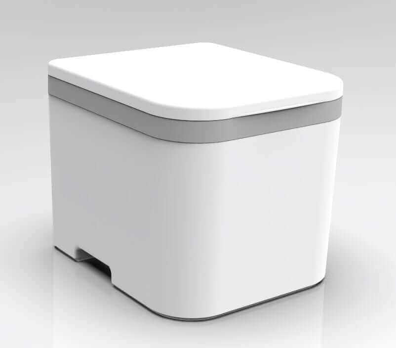 OGO Nomad compost toilet with modern design, available at Cabin Depot. Features urine separation and compostable bag system.