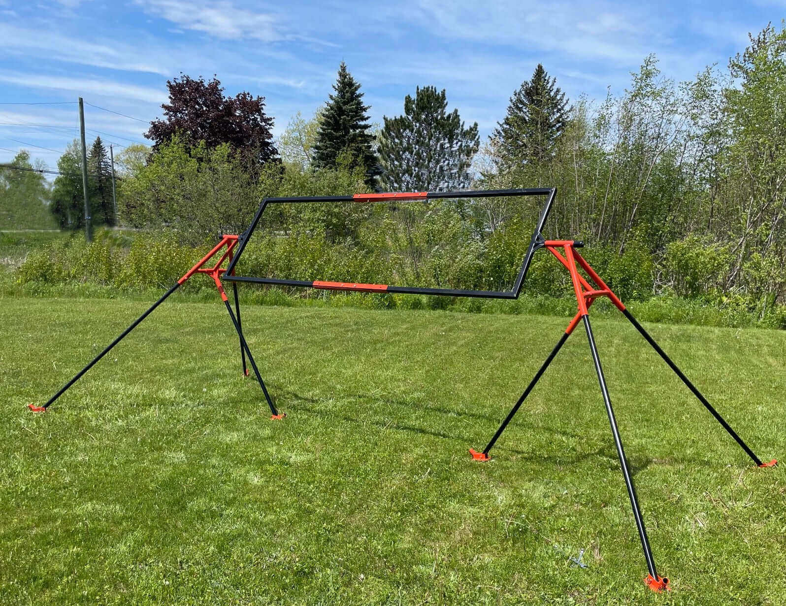Trifecta 3-Panel Ground Mount Kit by Cabin Depot™ on grassy field, adjustable tilting system for easy installation, Canada made