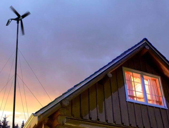 Primus 48V Wind Power Air 40 by Cabin Depot mounted on a house, ideal micro-wind turbine for off-grid power solutions.