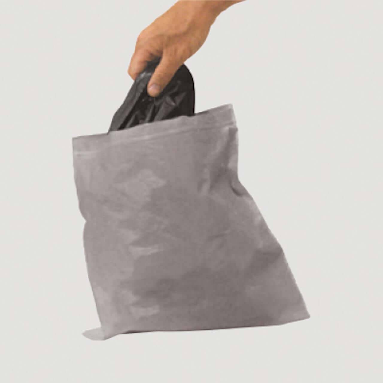 Reliance Double Doodie waste bags with Bio-Gel for portable toilets from Cabin Depot, featuring leak-proof double zip lock and puncture-resistant design.