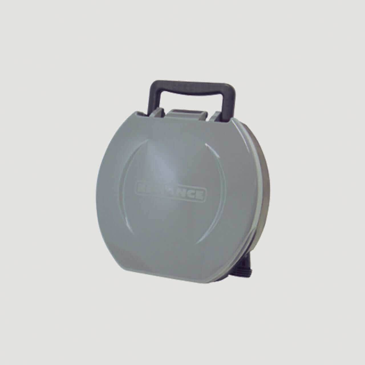 Reliance Fold-To-Go portable toilet with carrying handle, ideal for camping and emergencies, available at Cabin Depot.