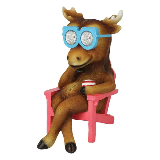 Moose in chair LED solar garden light with blue glasses and pink seat, hand-painted poly resin design for outdoor use.