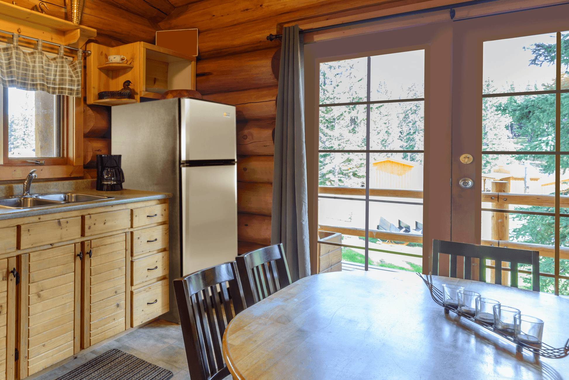 SunStar 16CU Solar/DC Refrigerator in cabin kitchen, energy-efficient appliance available at Cabin Depot