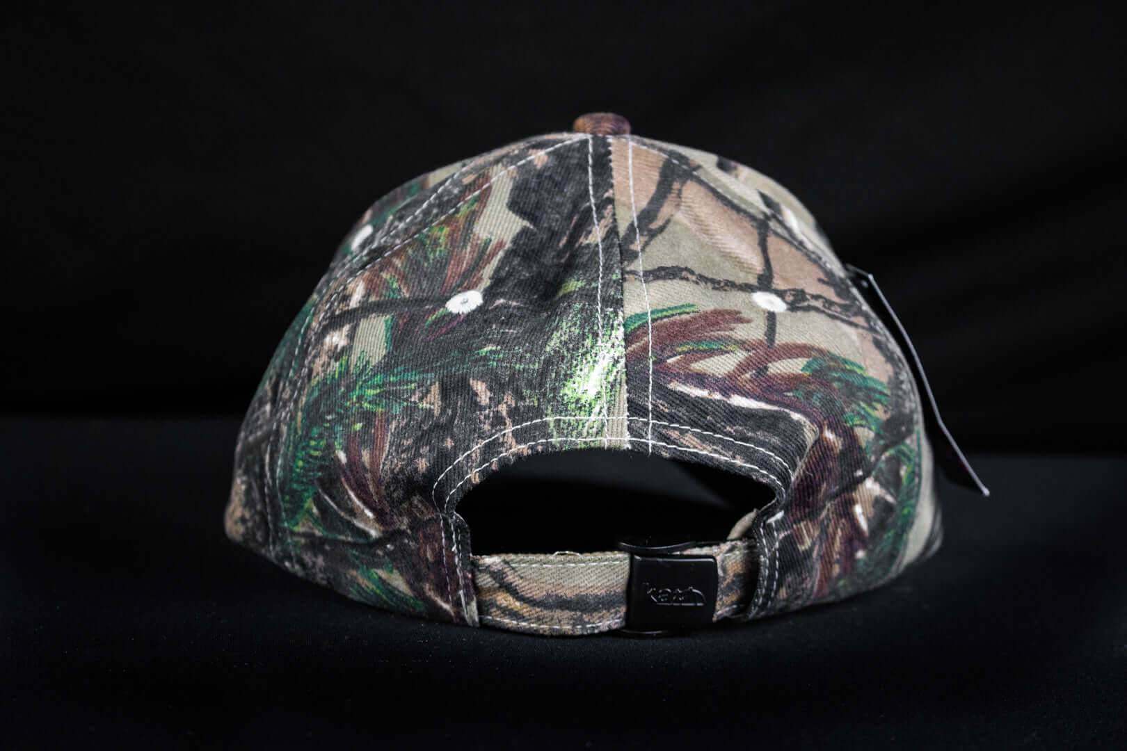 Back view of Cabin Depot Camo Realtree Max4 hat, showcasing adjustable strap and camouflage design; perfect for outdoor enthusiasts.