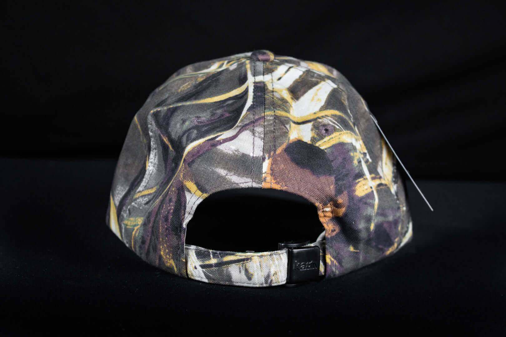 Back view of The Cabin Depot Cap in Camo Realtree Max4, adjustable one-size Kati Sportscap, showcasing its design and buckle feature.