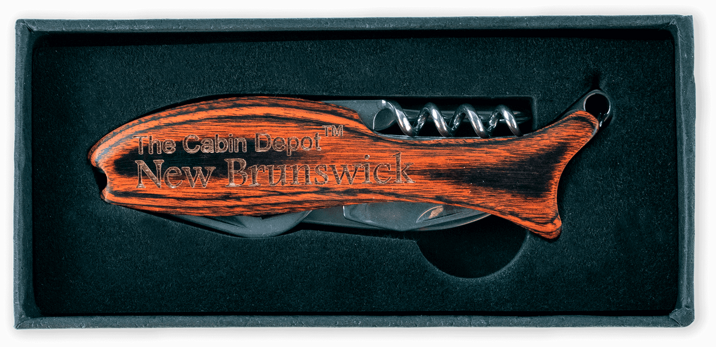 Wooden fish-shaped multi-tool knife with engravings, by North West Laser Designs, displayed in a black box.