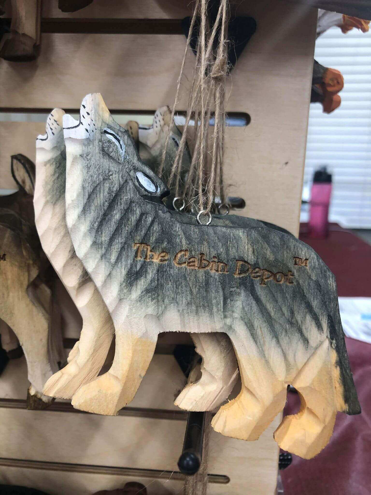 NWL wooden wolf ornament from The Cabin Depot, hand-crafted decor.