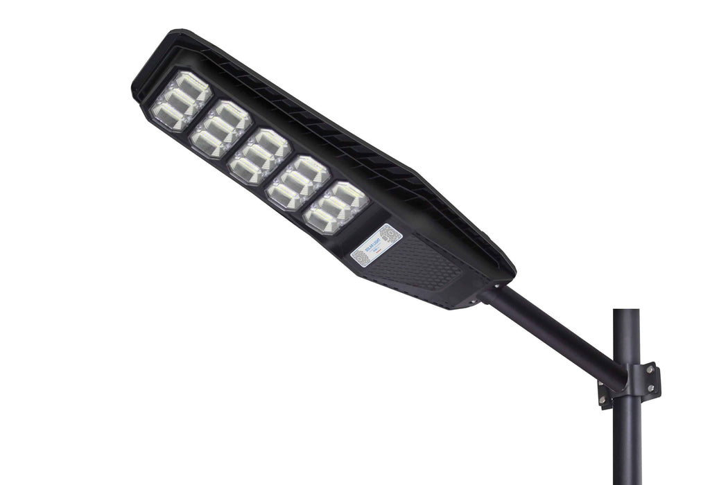 Intrepid Pioneer 300W Solar Street Lamp with LED lights on a pole for outdoor security and pathway illumination