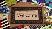 Sassafras mat inserts with "Welcome" design in decorative tray, available at Cabin Depot for seasonal or occasion customization.