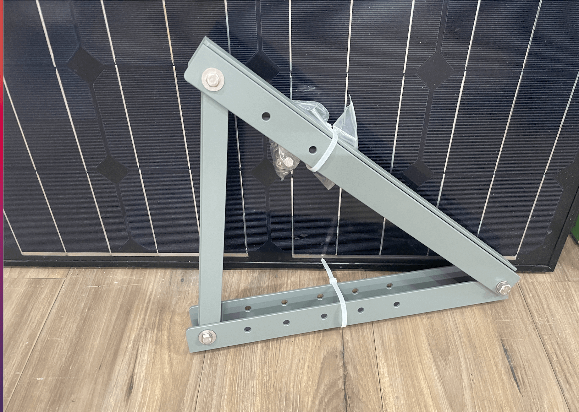 Adjustable Tilt Solar Brackets for Small Panels by Cabin Depot, shown with assembly hardware, ideal for 20W to 150W panels on flat surfaces.