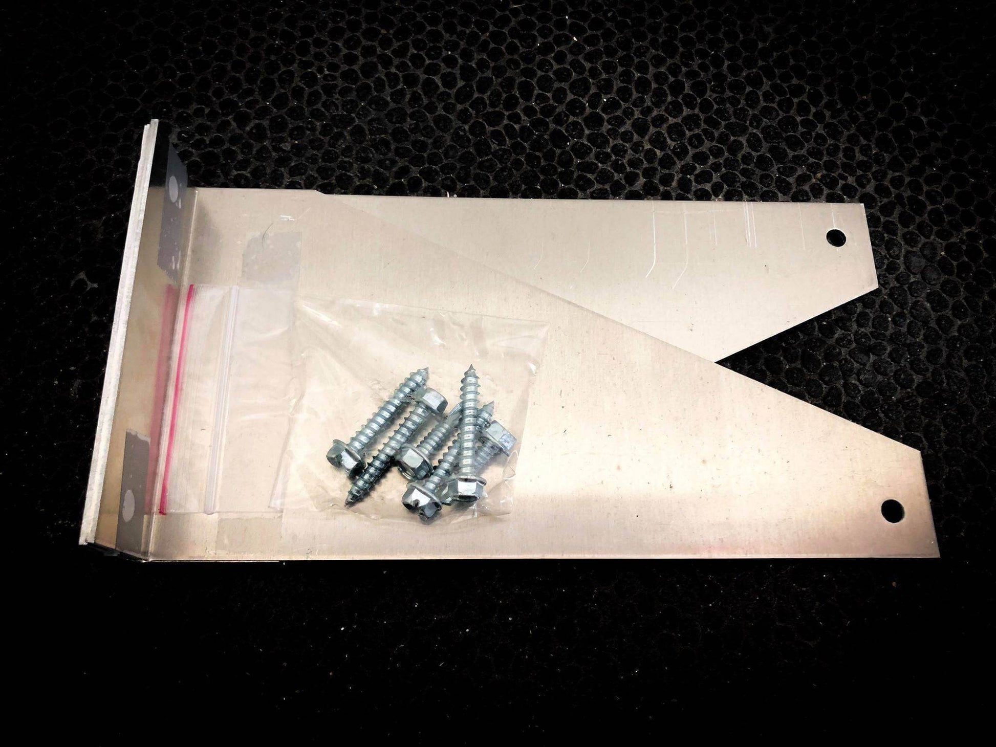 Kedron 9-inch bracket from Cabin Depot for solar panel wall mounting. Screws not included, shown for reference.