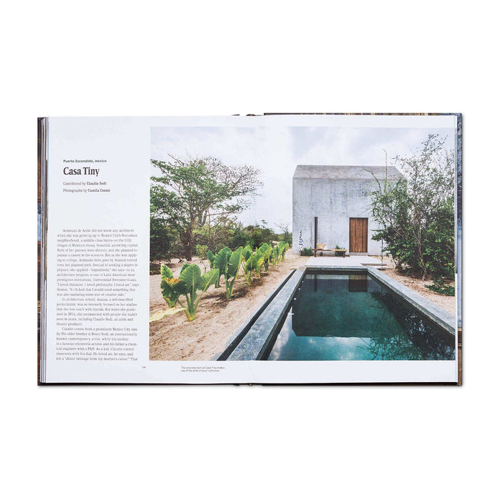 "Open book showing Casa Tiny cabin with pool, tranquil setting featured in Cabin Porn Inside Book"