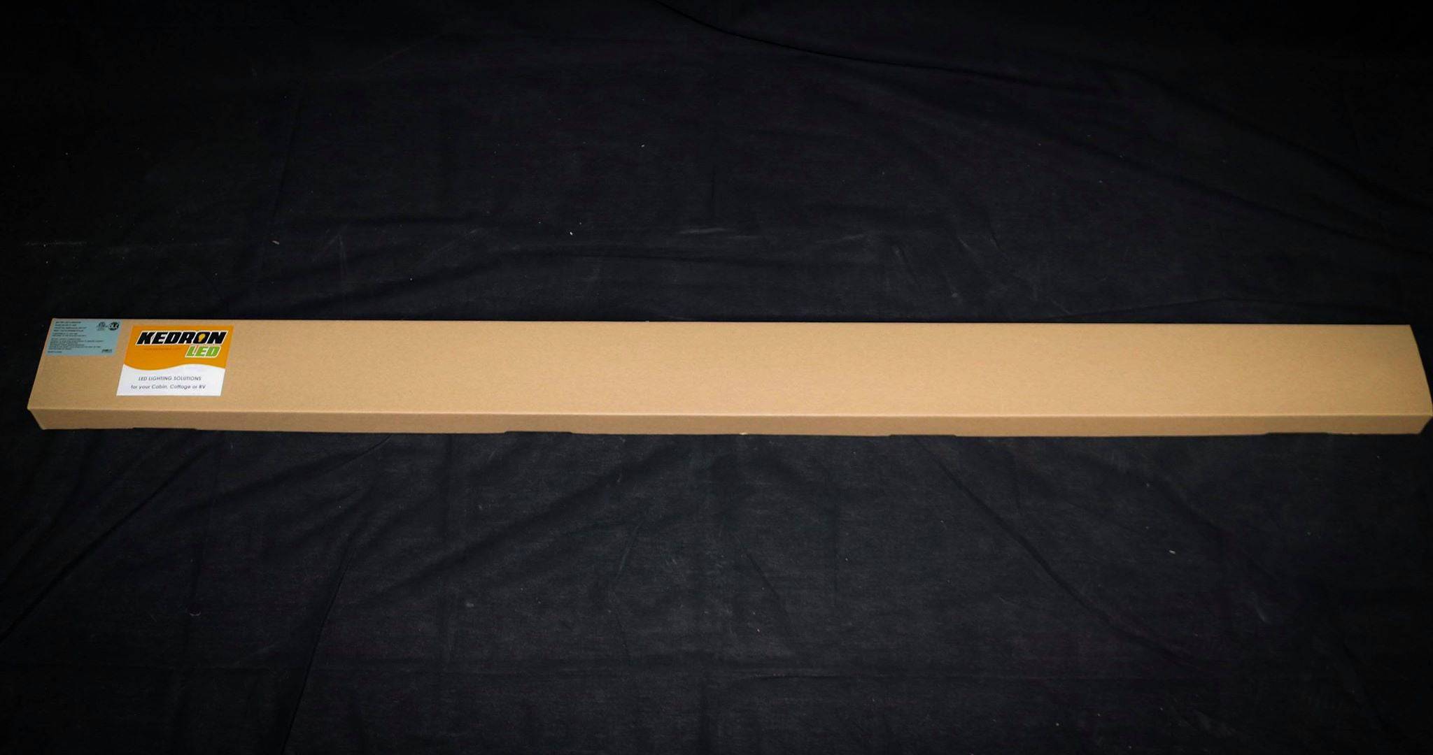Kedron 40W 120vAC LED 48" light in packaging, warm white, for residential, commercial, and industrial use - Cabin Depot
