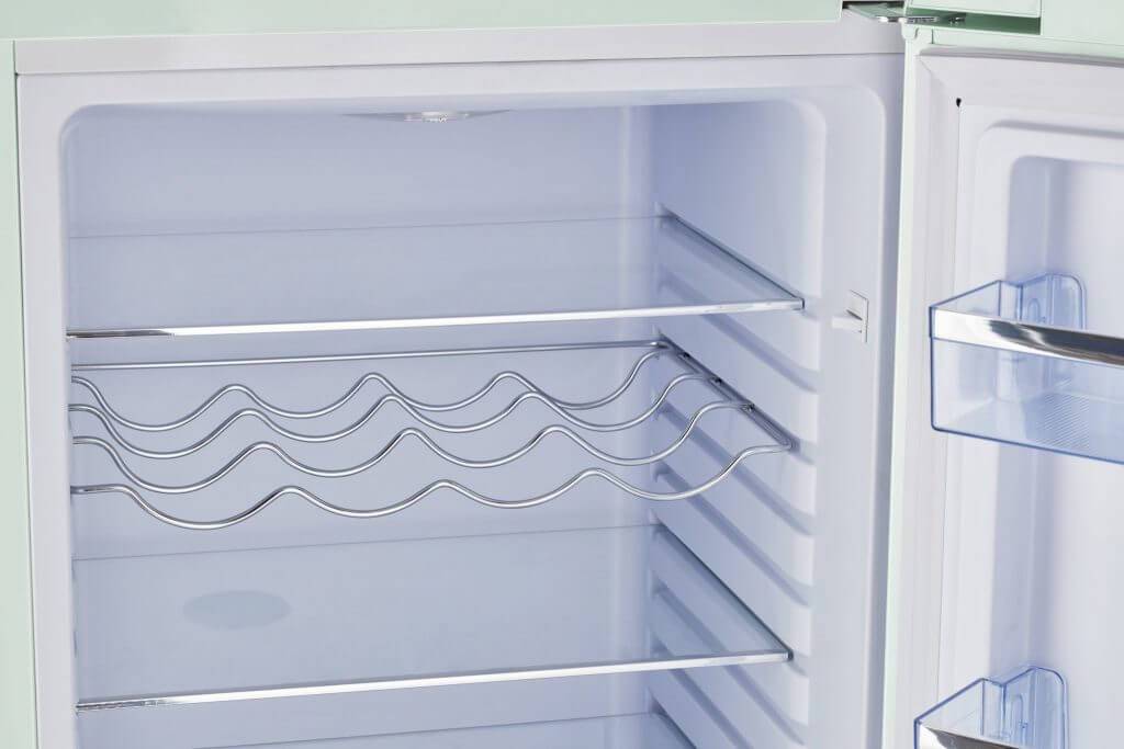 Interior view of Unique 9 Cu/Ft Bottom Mount Retro Refrigerator available at Cabin Depot