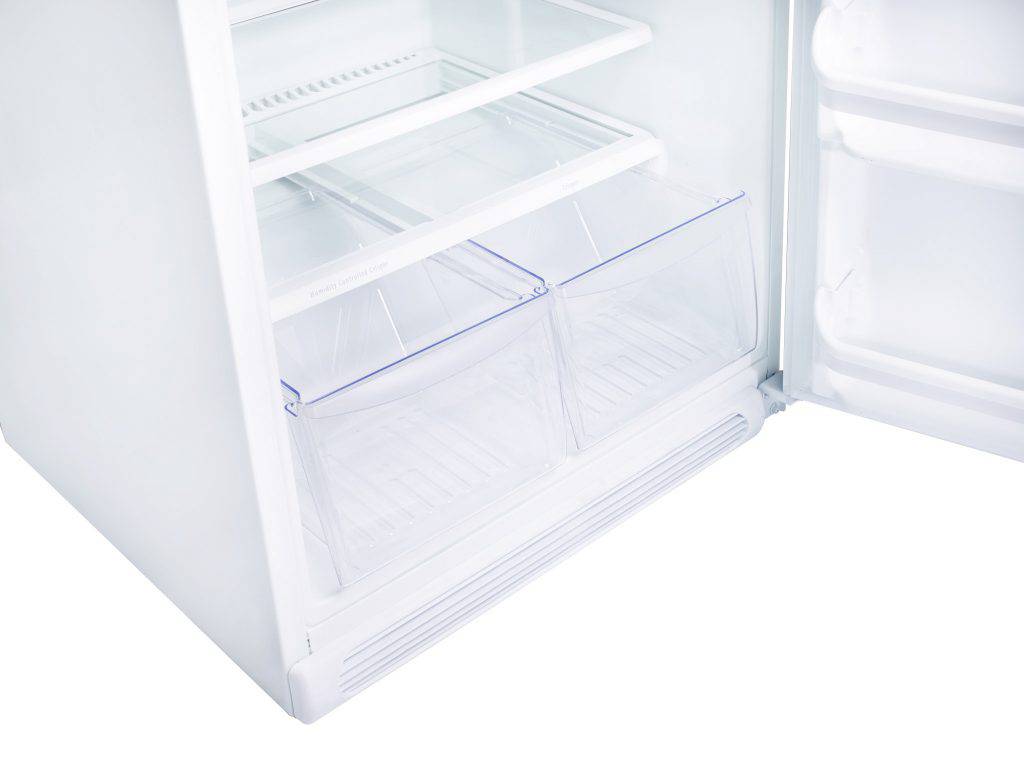 Interior view of Unique 22 Cu/Ft Direct Vent Propane Fridge, showcasing ample storage for cabin use, available at Cabin Depot.