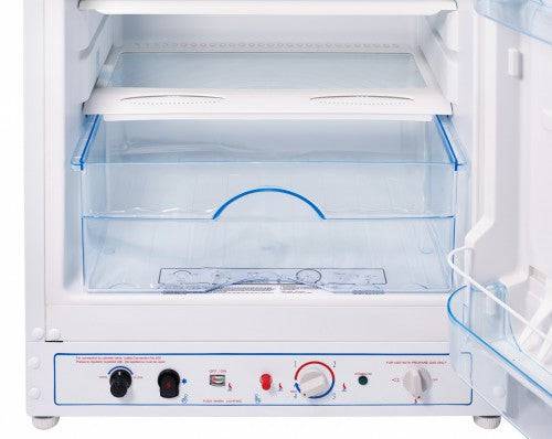 Open view of Unique 10 Cu/Ft propane fridge with freezer, showcasing interior shelves and controls, available at Cabin Depot.