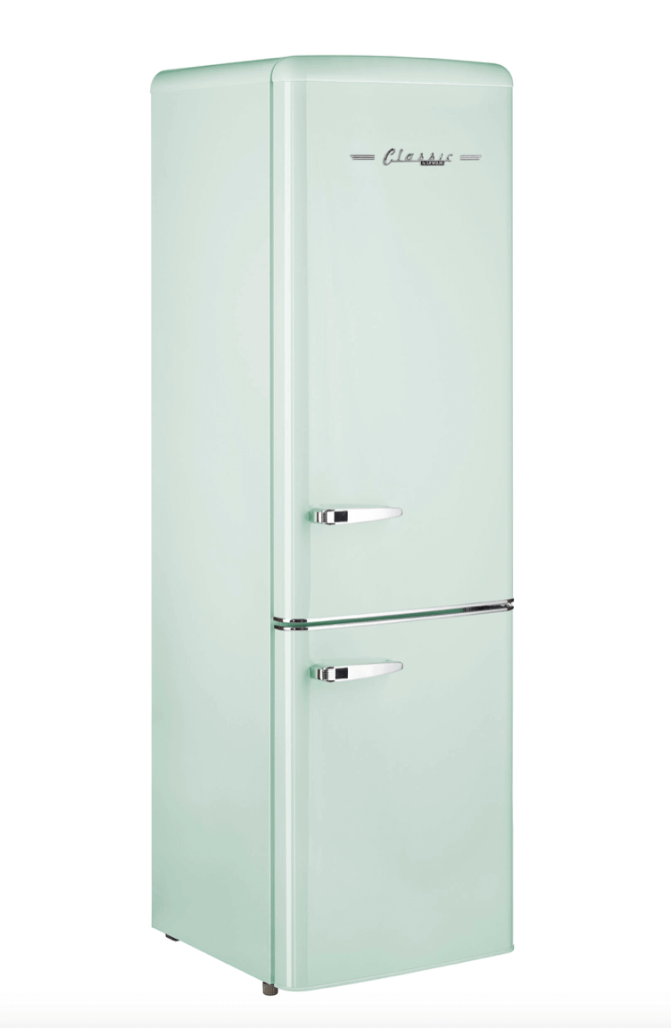 Unique 10 Cu/Ft Retro Solar Powered DC Fridge with Freezer from Cabin Depot, energy-efficient off-grid appliance.