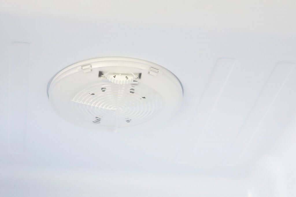 Interior view of Unique 10 cu/ft Retro Solar Powered DC fridge's light fixture, available at Cabin Depot.