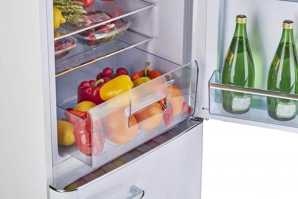 Interior view of Unique 7 cu/ft bottom mount retro AC refrigerator in marshmallow white, available at Cabin Depot.