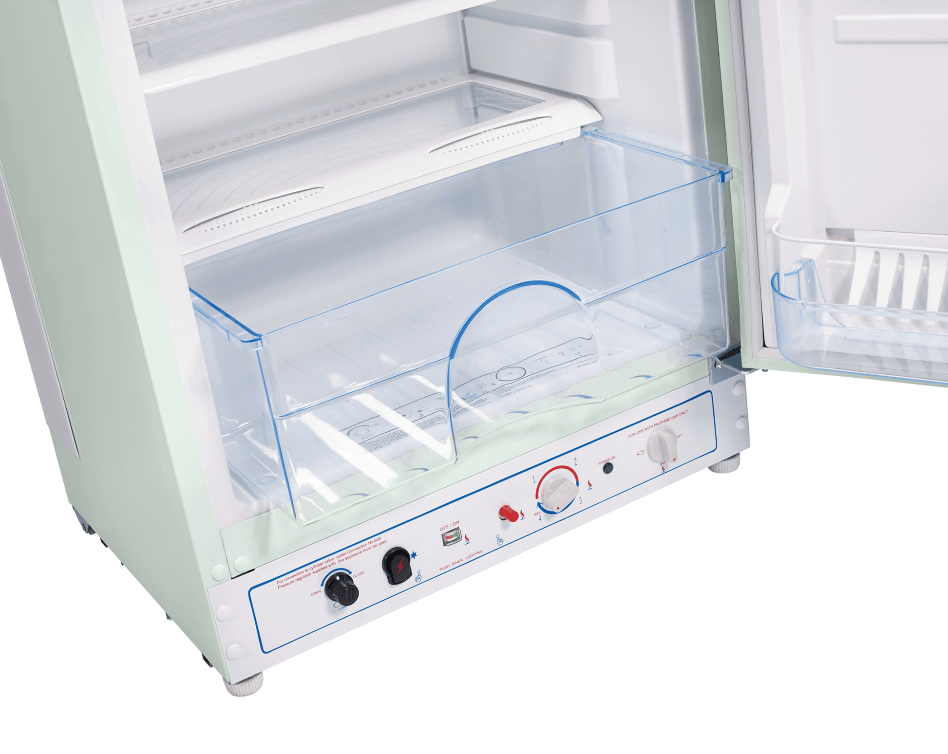 Light green retro propane fridge with chrome accents, open view. Ideal for off-grid cabin kitchens. Available at Cabin Depot.