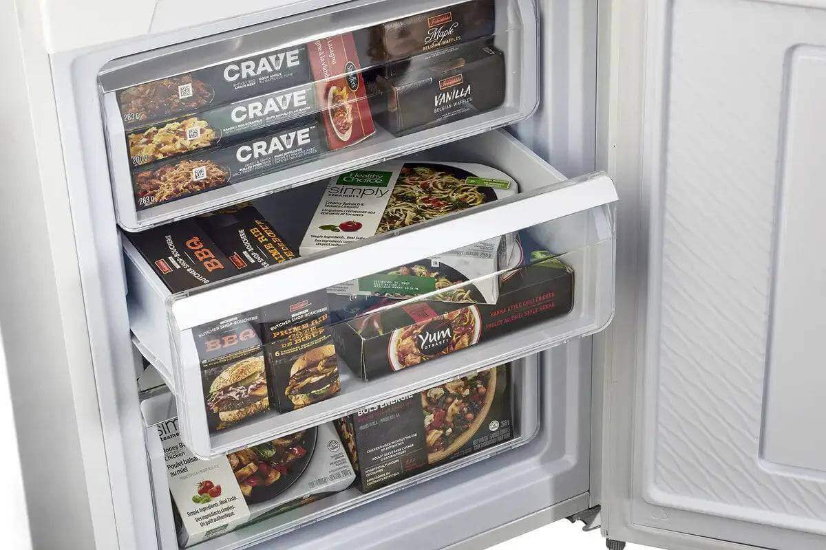 Open freezer of Unique 12 Cu/Ft 325L DC fridge at Cabin Depot, showcasing frost-free design and spacious, packed shelves for energy efficiency.