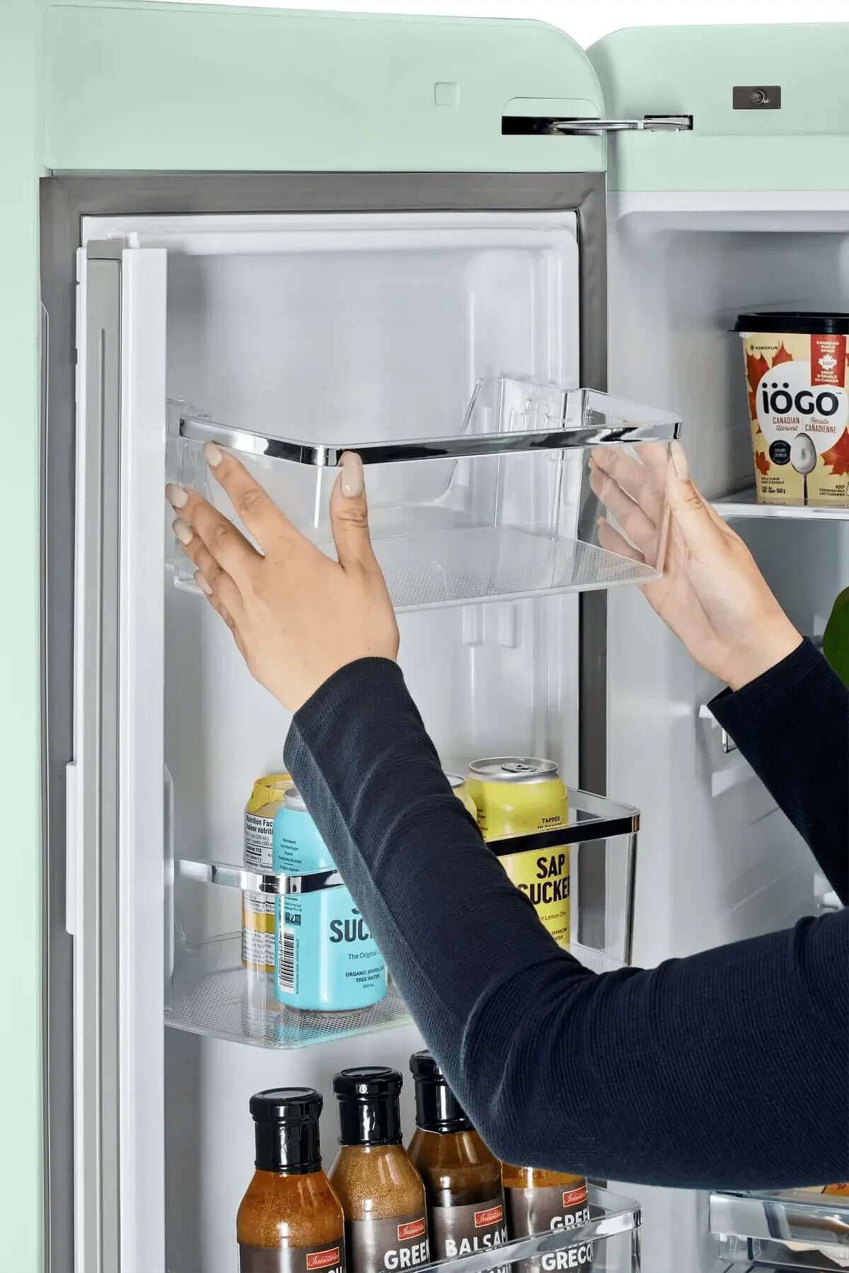 Adjustable shelf in Unique 21.4 Cu/Ft French Door Refrigerator from Cabin Depot, showcasing versatile storage. Energy Star rated and frost-free.