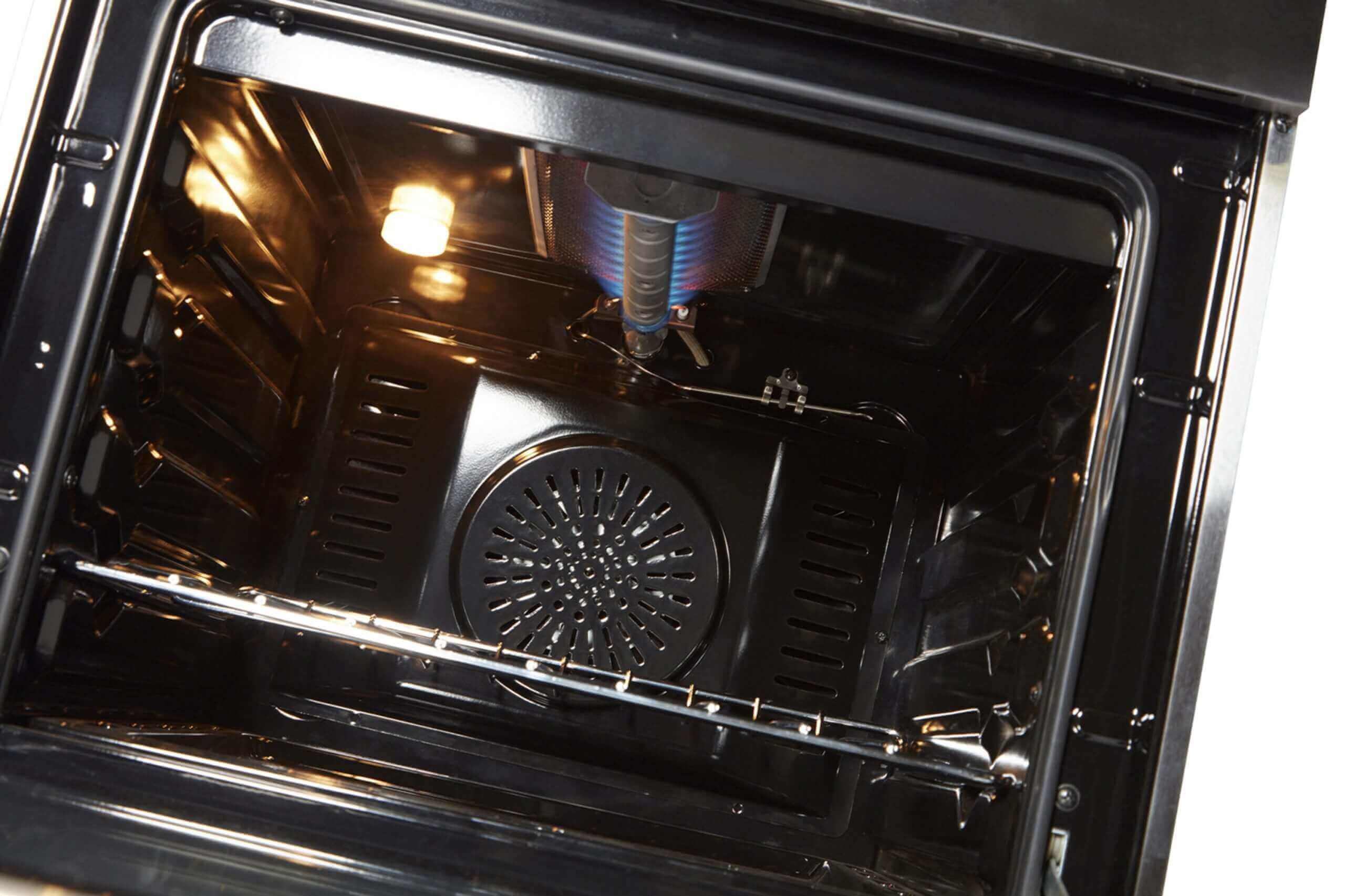 Interior view of Unique Prestige 24" Convection Gas Range oven from Cabin Depot, showcasing electric ignition and stainless steel design.