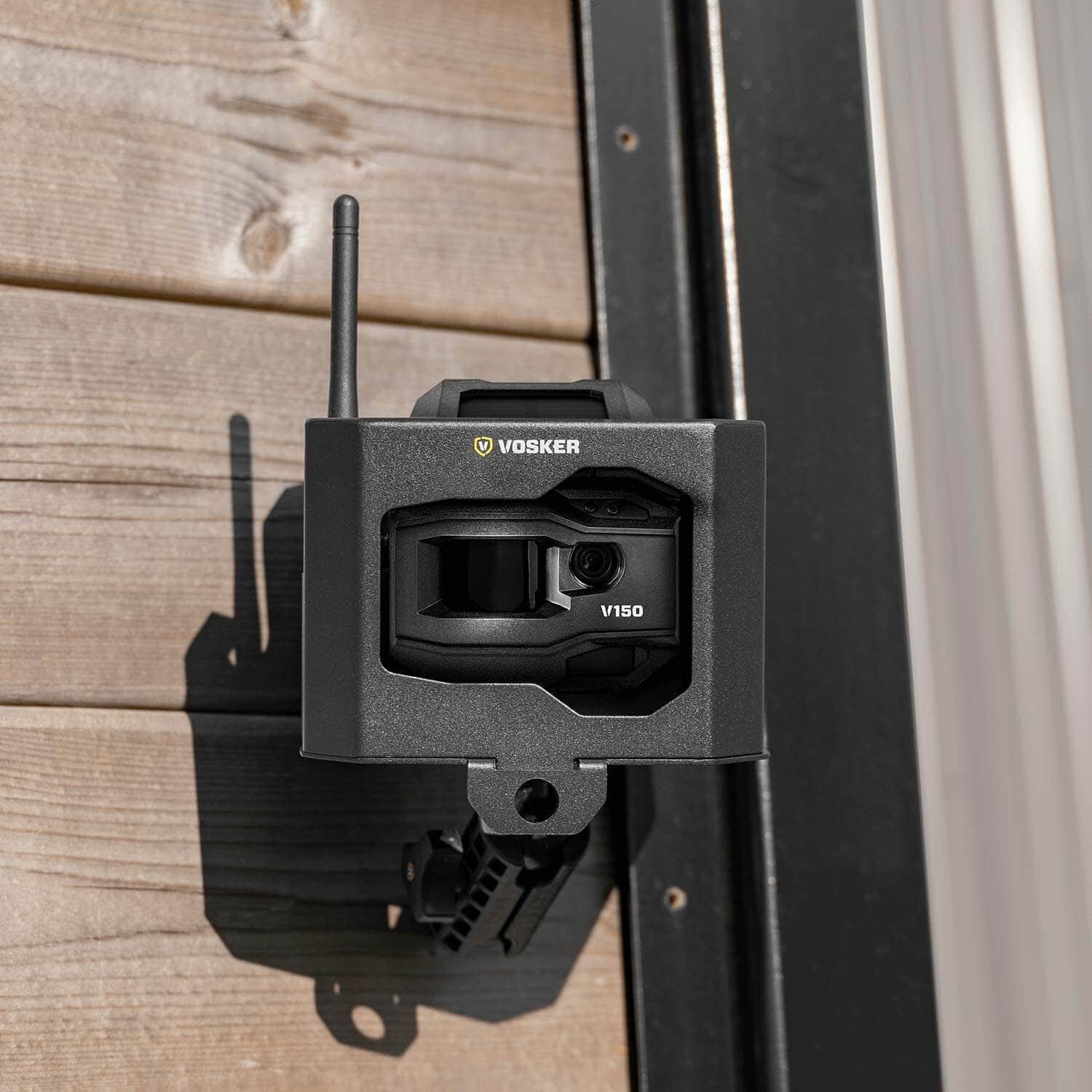 Vosker V150 security camera in steel security box, mounted on wooden wall, Cabin Depot weather-resistant protection