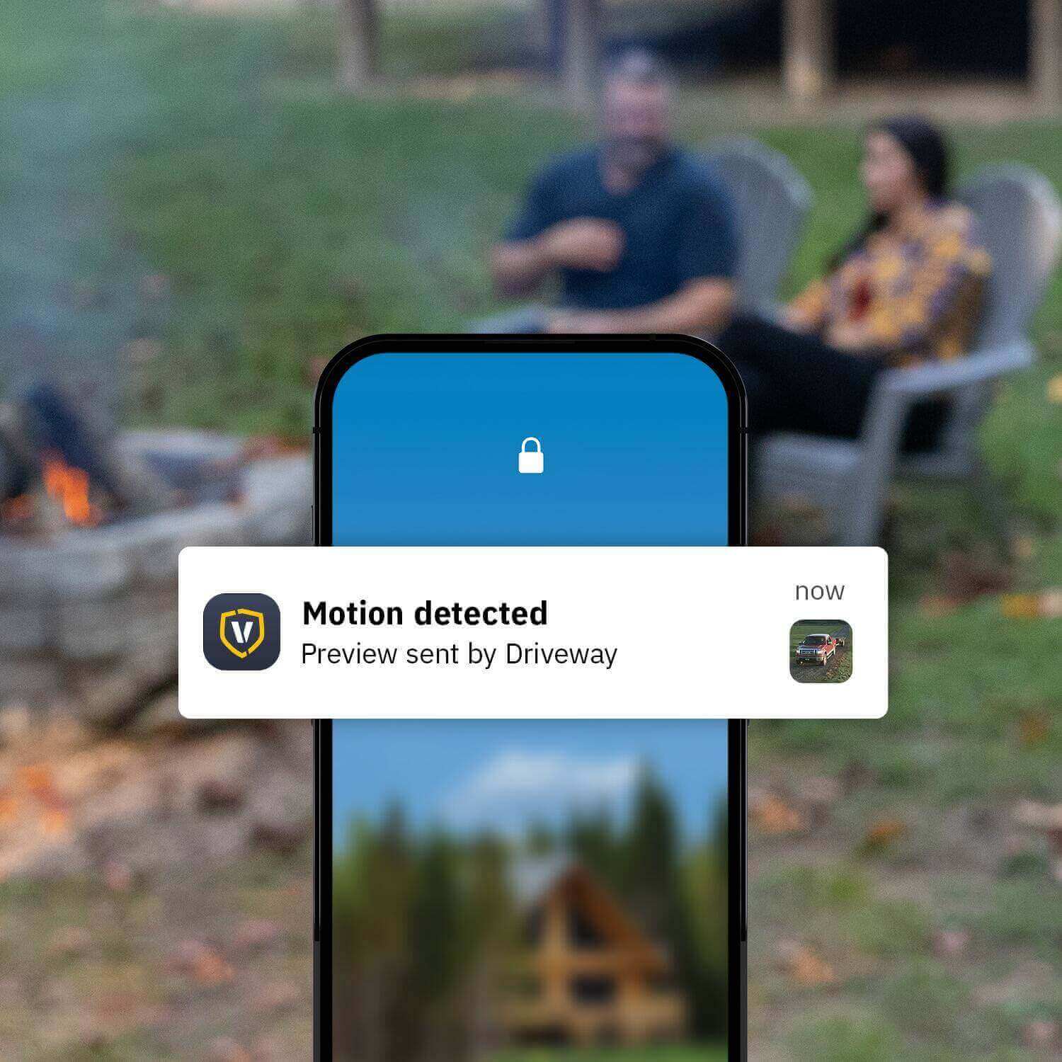 Smartphone showing Vosker V300 camera alert for motion detection near a cabin, highlighting security features from Cabin Depot.