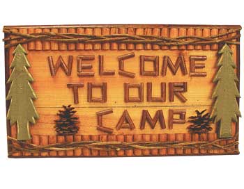 Rustic wooden sign with "Welcome to Our Camp" text, adorned with twig and tree designs, measuring 18x10.5 inches.