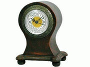 Wilcor Antique Round Top Clock at Cabin Depot, detailed wooden design, 5.5 by 7 inches, adds vintage charm. Uses AA battery, not included.