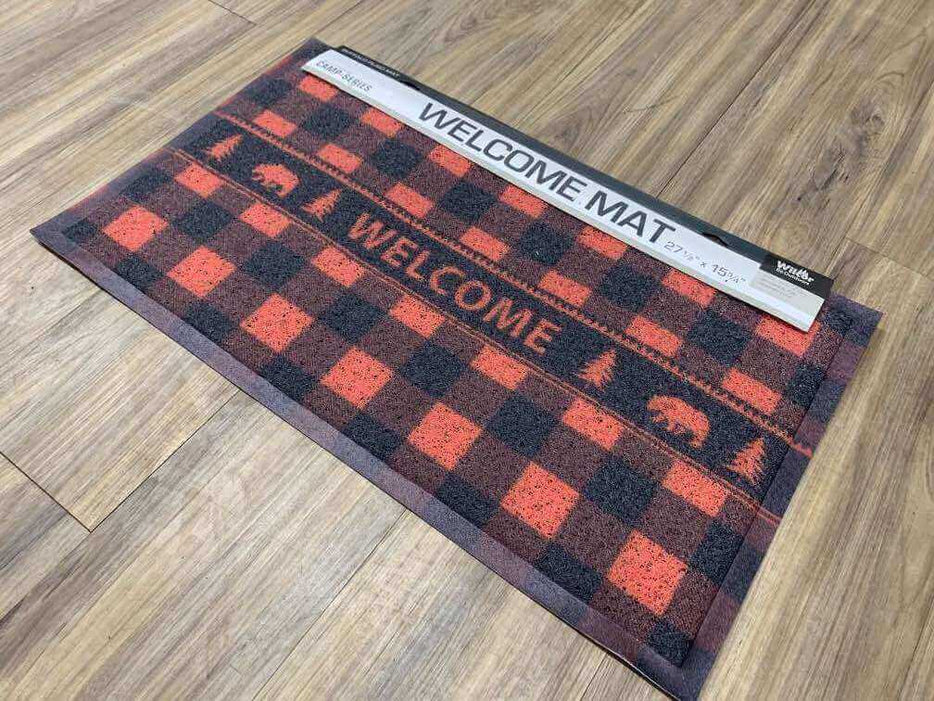 Buffalo plaid welcome floor mat with bear design, red and black checkered pattern, size 15.75"x27.5", on wooden floor.