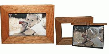 Oak album picture frame displaying a child's photograph, with an additional empty frame beside it.