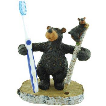 Bear-shaped toothbrush and pen holder featuring two slots, with space for a brush, on a 6.5" x 5.5" base.