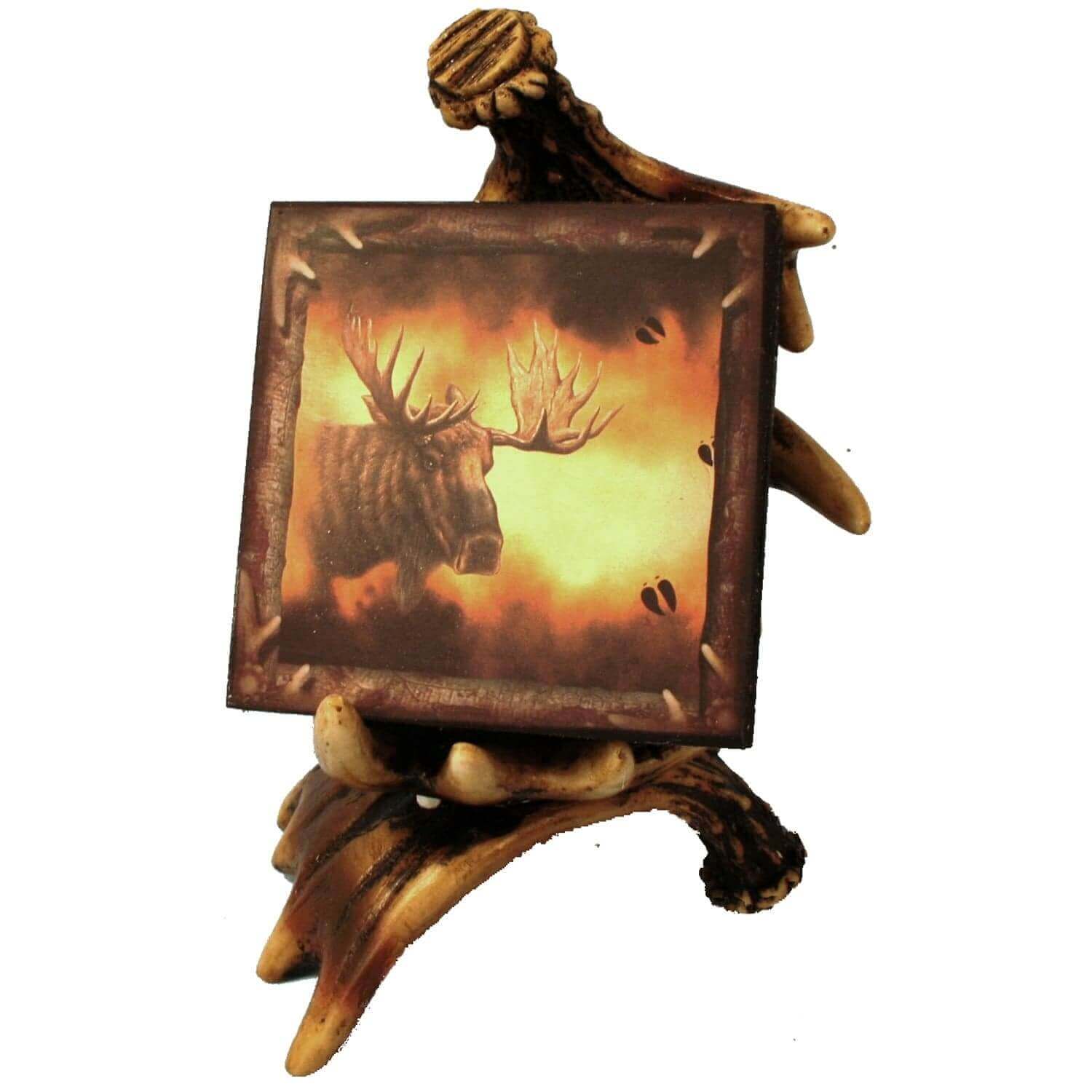 Moose Coaster Set in poly resin antler, hand painted. Perfect cabin decor available at Cabin Depot. Holds four coasters.