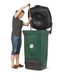 Woman using Biolan Biowaste 220 Eco Composter, designed for efficient year-round composting with advanced thermal insulation and ventilation.