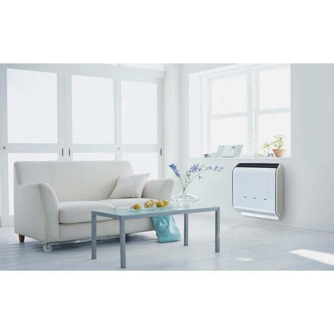 Modern living room with Drolet 13,750 BTU Direct Vent Heater DV45 from Cabin Depot on wall, showcasing energy-efficient design.