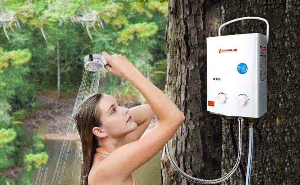 Woman enjoying outdoor shower with Camplux 5L portable tankless water heater, ideal for cabins and camping. Available at Cabin Depot.