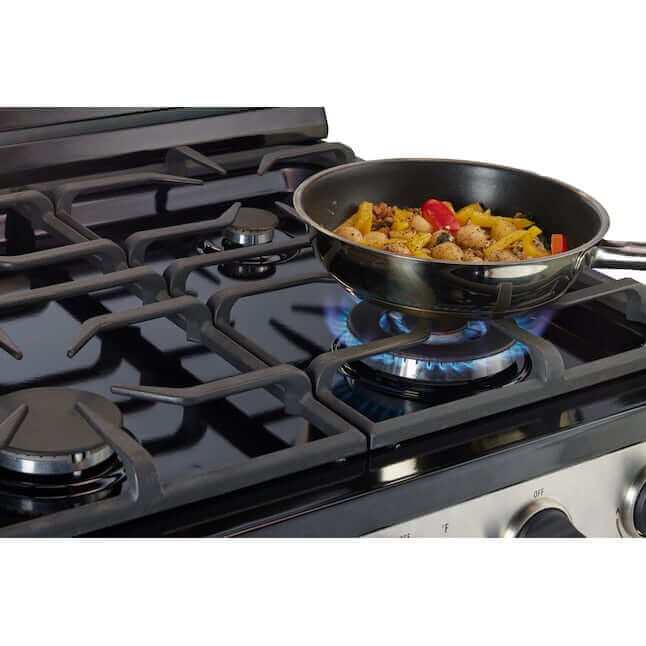 Unique 30" Propane Range with cast-iron grates in use, showcasing cooking performance. Available at Cabin Depot.