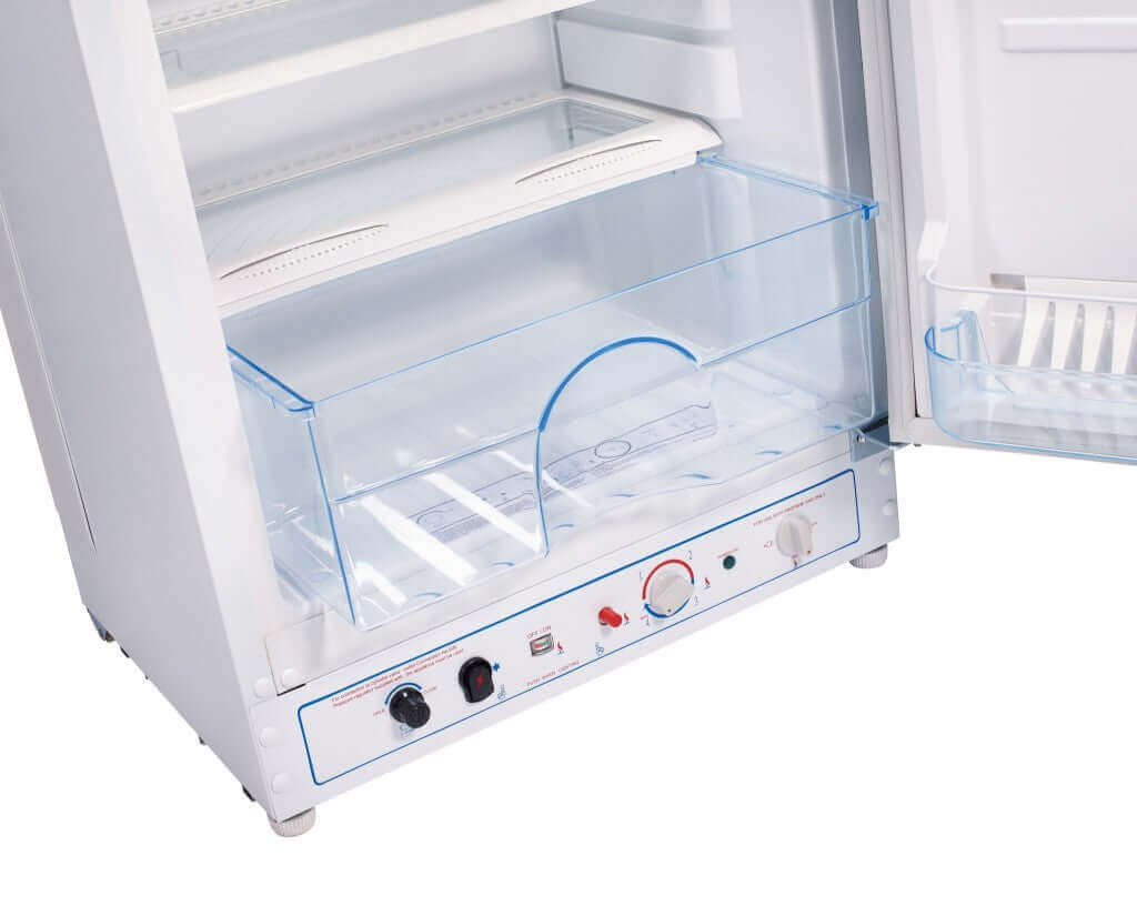 Interior of Unique 8 Cu/Ft Propane Fridge with Freezer, showcasing spacious design and controls, available at Cabin Depot.