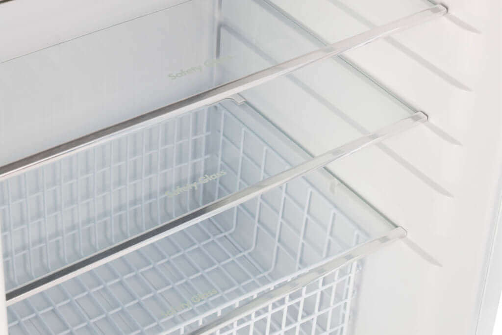 Interior view of Unique 14 Cu/Ft propane fridge with adjustable shelves from Cabin Depot