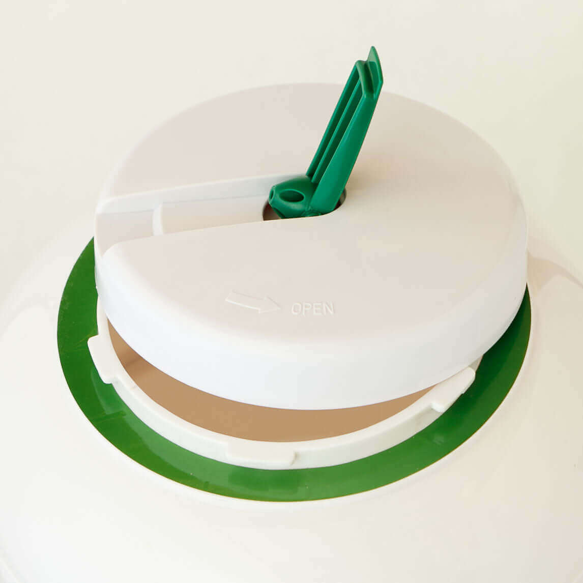 Close-up of WonderWash Portable Washing Machine lid, eco-friendly hand-operated, available at Cabin Depot.