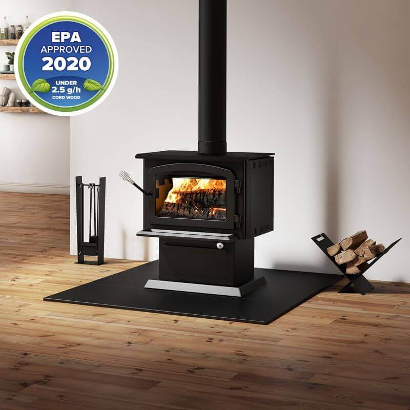 Drolet Blackcomb II Wood Stove in room setting, EPA certified, heats 1,800 ft², sold by Cabin Depot. Ideal for eco-friendly heating.