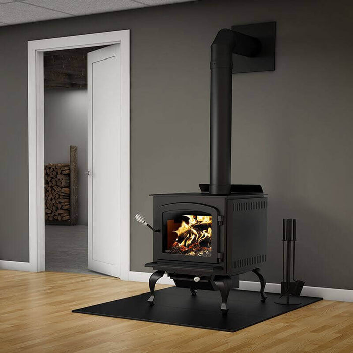 Drolet Legend III Wood Stove in modern room, showcasing firebox and blower, ideal for eco-friendly heating up to 2,300 ft².